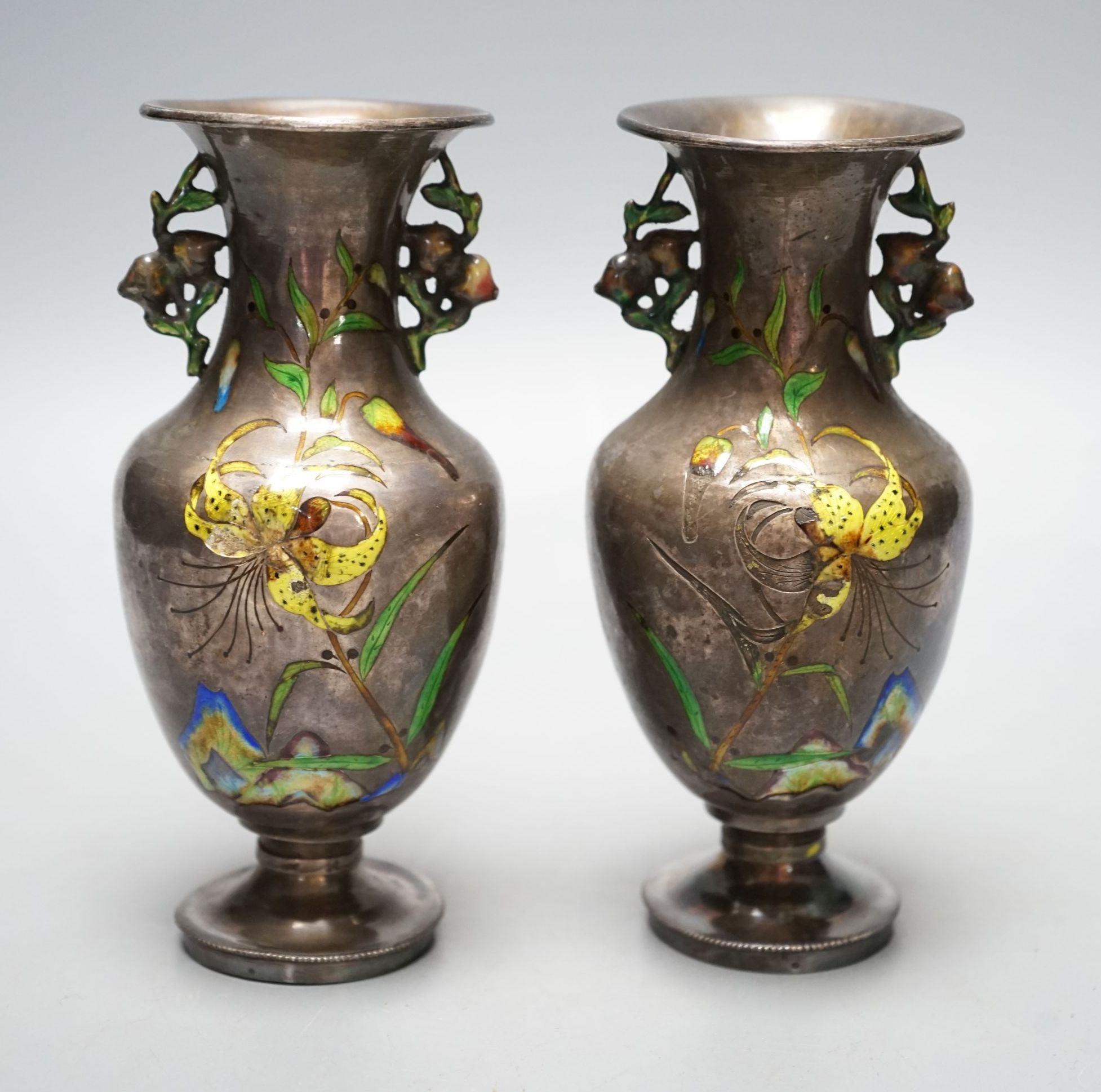 A pair of nice quality Chinese silver and enamel vases, late 19th century, 15 cms high.
